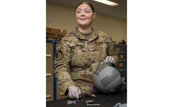 Photo Of U.S. Air Force Senior Airman Hailey Edie configures a HGU-55/P Helmet at Yokota Air Base.