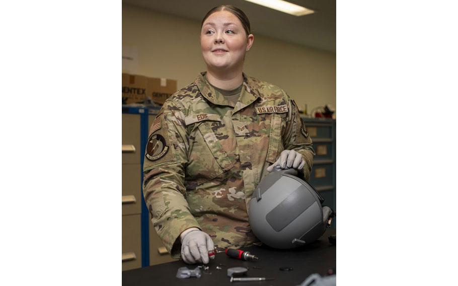 U.S. Air Force Senior Airman Hailey Edie configures a HGU-55/P Helmet at Yokota Air Base.