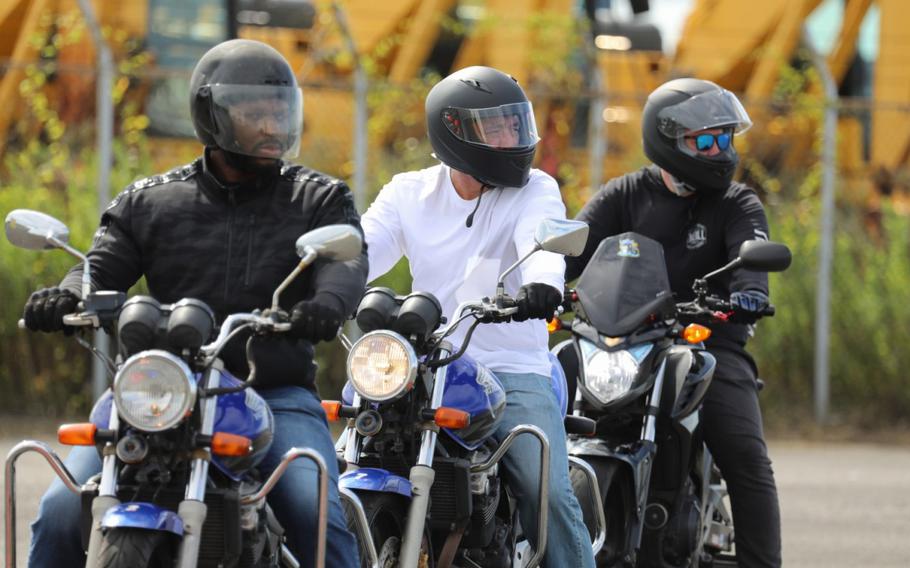 Student bikers wait to conduct an exercise during the Basic Rider Course 1 at Yokohama North Dock, Japan, July 19, 2024. U.S. Army Garrison Japan recently restarted its motorcycle safety courses after a yearslong hiatus to train more riders.