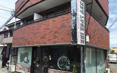 Photo Of New Luck Ink front. bricks are used for the outer wall.