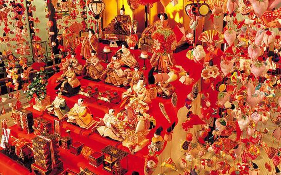 Traditional hina dolls surrounded by modern hanging decorations - it seldom gets more Japanese than this!