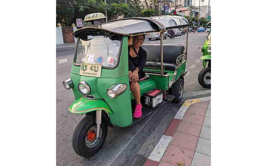 Chrissy taking tuktuk