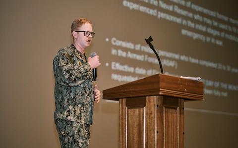 Photo Of Master-at-Arms 1st Class Justin Hamilton, Commander, Fleet Activities Yokosuka Command Career Counselor, introduces the first topic of CFAY’s Sailor 360 program March 12, 2024 at the installation’s Benny Decker Theater. Hamilton is the command’s Sailor 360 program coordinator and is tasked with bringing the training program back to live, in person sessions to ensure the correct information and resources are provided to CFAY and Yokosuka-based Sailors. 