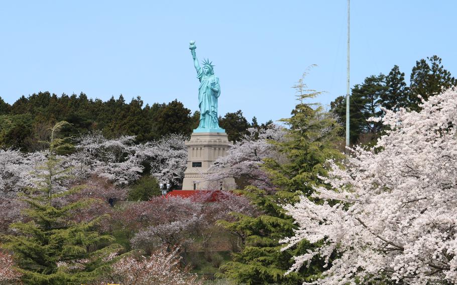 Oirase Town - sakura and the Statue of Liberty