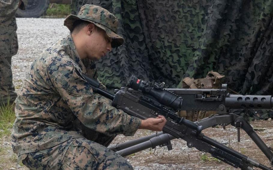 Cpl. Christian MirandaSanatana demonstrates the weapon conditions on an M240B machine gun.