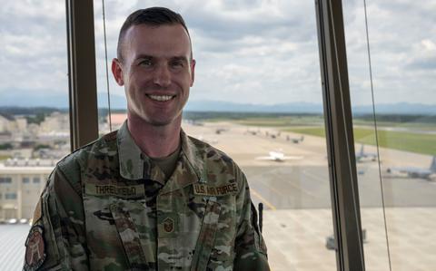 Photo Of U.S. Air Force Master Sgt. Philip Threlkeld poses for a photograph.