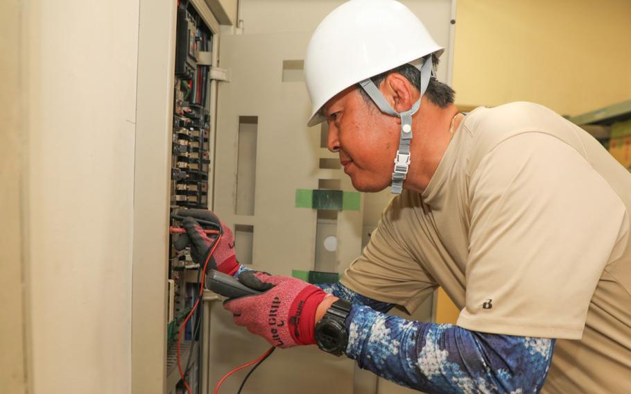 Hideki Yamada, an electrician for the Directorate of Public Works, performs a test on circuit breakers at the Akizuki Ammunition Depot in Japan, Sept. 5, 2024. The DPW workforce handles various skilled trade and office jobs to support tenant organizations, including the 10th Support Group and its three ammunition depots.