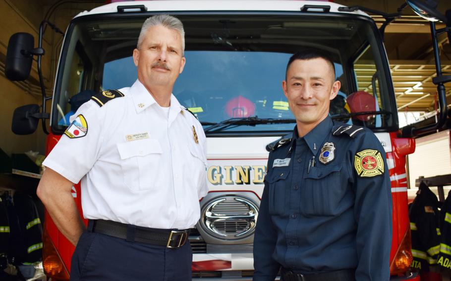 J.D. Felty, left, regional deputy fire chief, U.S. Army Garrison Japan Fire and Emergency Services, and Yu Mori, a firefighter with USAG Japan Fire and Emergency Services, pose for a photo at the department’s Station 1 at Camp Zama, Japan, Jan. 31, 2020. Installation Management Command-Pacific named Felty best fire officer in the Pacific region and Mori best civilian firefighter.