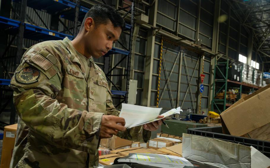 U.S. Air Force Staff Sgt. Fyronne Fabay, 374th Civil Engineer Squadron execution support NCOIC, reviews a list of items during a unit type code familiarization training at Yokota Air Base, Japan, Oct. 3, 2024.