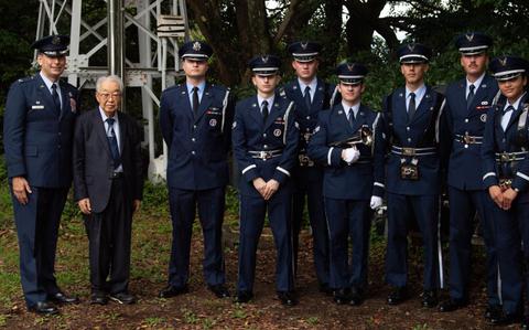 Photo Of U.S. Air Force Col. Andrew Roddan, 374th Airlift Wing commander; Dr. Hiroya Sugano, B-29 ceremony host, and members of the Yokota Air Base honor guard pose for a photo during the B-29 Memorial Ceremony at Mt. Shizuhata, Japan, June 29, 2024.