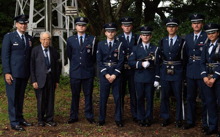 U.S. Air Force Col. Andrew Roddan, 374th Airlift Wing commander; Dr. Hiroya Sugano, B-29 ceremony host, and members of the Yokota Air Base honor guard pose for a photo during the B-29 Memorial Ceremony at Mt. Shizuhata, Japan, June 29, 2024.