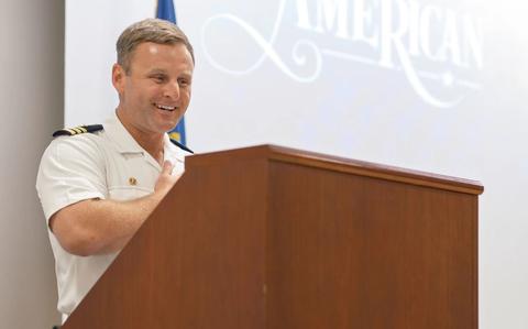 Photo Of Cmdr. Eric Smitley, commanding officer, USS Howard (DDG 83), speaks at Region Legal Services Office Western Pacific Yokosuka’s U.S. Naturalization Ceremony with U.S. Citizenship and Immigration Services at Commander, Fleet Activities Yokosuka.