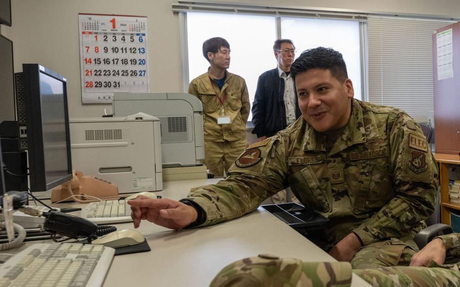 U.S. Air Force Technical Sgt. Enrique Flores, Non-Commissioned Officer in Charge of the 35th Civil Engineering Squadron electrical systems flight, demonstrates Supervisory Control and Data Acquisition (SCADA) during a Wild Weasel Walk-through at Misawa Air Base, Japan, Jan. 4, 2024. The SCADA systems are used for controlling, monitoring and analyzing industrial devices and processes. (U.S. Air Force photo by Kohei Sugisawa )