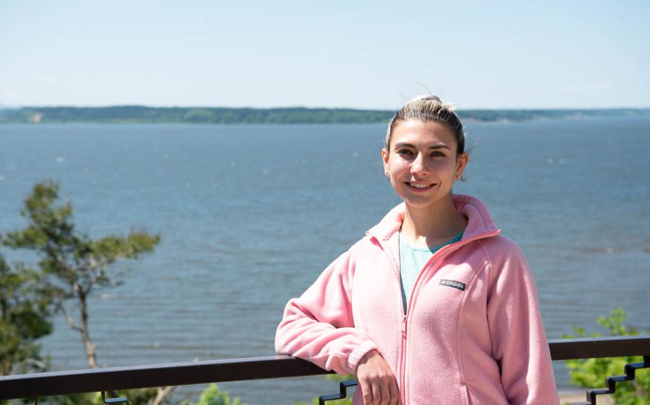 Tiffani Grochalski, American Red Cross Certificate of Merit award winner, poses for a portrait at Misawa Air Base, Japan, May 23, 2023. Tiffani was able to use her skills to save a life from choking during the Misawa Air Base 2022 Winterfest. (U.S. Air Force photo by Airman Koby Mitchell)