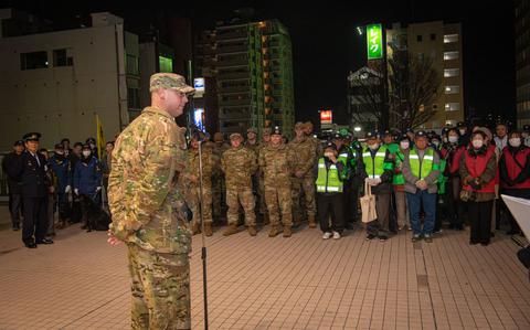 Photo Of U.S. Air Force Col. Richard McElhaney, 374th Airlift Wing commander, delivers opening remarks during the joint safety patrol in Fussa, Japan.