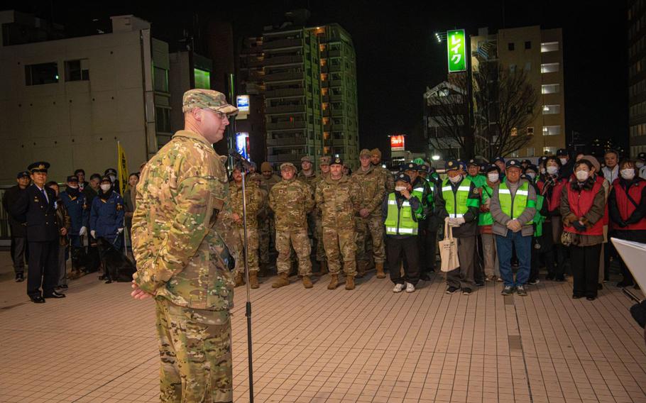 U.S. Air Force Col. Richard McElhaney, 374th Airlift Wing commander, delivers opening remarks during the joint safety patrol in Fussa, Japan.