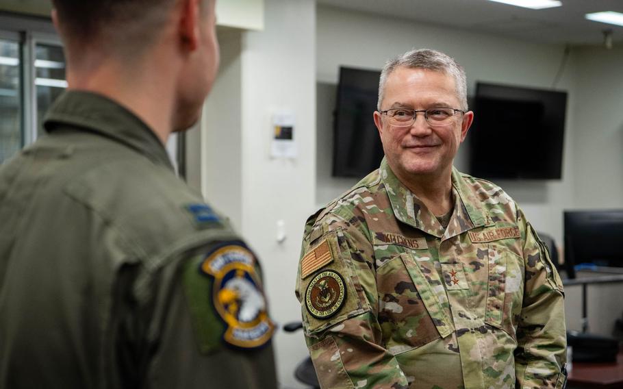 U.S. Air Force Chaplain (Maj. Gen.) Randall Kitchens, USAF chief of chaplains, listens to Capt. Matthew Helm, 459th Airlift Squadron UH-1N pilot, speak about the mission of the 459th AS at Yokota Air Base, Japan, Feb. 23, 2024. The 459th AS maintains UH-1N aircrews to conduct aeromedical evacuations, search and rescues and priority airlift missions throughout the Indo-Pacific region.