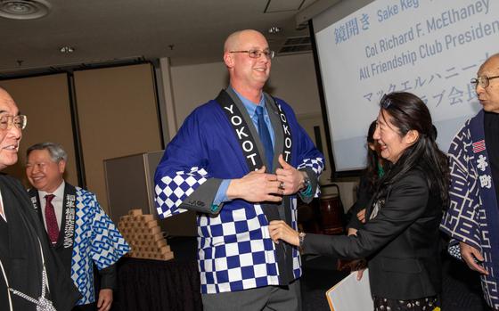 Photo Of U.S. Air Force Col. Richard McElhaney, 374th Airlift Wing commander, dons a happi coat during the annual Yokota Friendship Clubs’ New Year’s Party at Yokota Air Base, Japan.