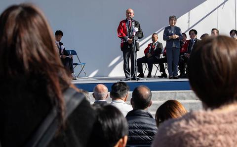 Photo Of Yasuhiro Yamazaki, Musashimurayama City mayor, gives opening remarks during the Dehdara Festival in Musashimurayama City, Japan, Nov. 9, 2024.