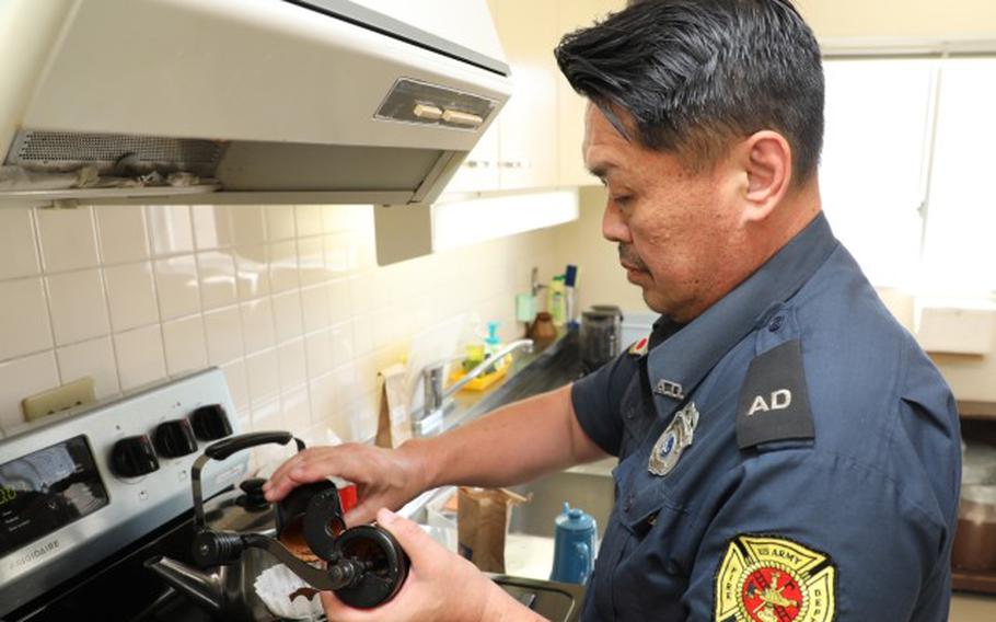 Eishin Marumoto, a U.S. Army Garrison Japan fire alarm dispatcher, makes a fresh pot of coffee inside the Akizuki Ammunition Depot fire station in Japan Sept. 5, 2024.