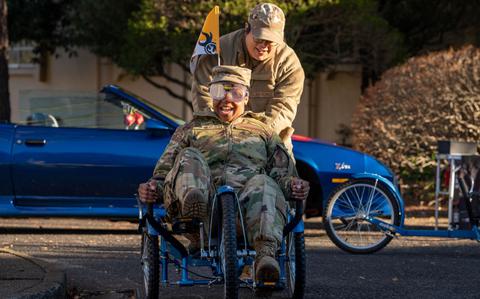 Photo Of U.S. Air Force Master Sgt. Tracy Sims, 374th Airlift Wing religious affairs superintendent, drives a cart while wearing beer goggles during a drunk driving simulation held at the main chapel at Yokota Air Base, Japan, Jan. 10, 2025.