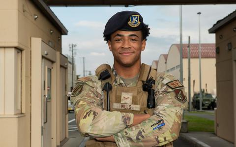 Photo Of U.S. Air Force Airman 1st Class Kevin Mills, 374th Security Forces Squadron base defense member, poses for a photo at Yokota Air Base, Japan.