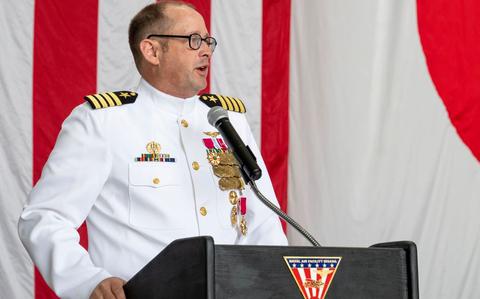 Photo Of U.S. Navy Capt. Paul A. Hockran, outgoing commanding officer, Naval Air Facility (NAF) Misawa, speaks during the NAF Misawa change of command ceremony on board Misawa Air Base.