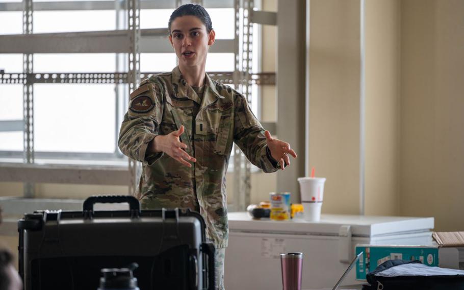 U.S. Air Force 1st Lt. Sarah Rego, 35th Civil Engineer Squadron Rapid Airfield Damage Repair (RADR) officer in charge, briefs Airmen on the RADR process at Misawa Air Base.