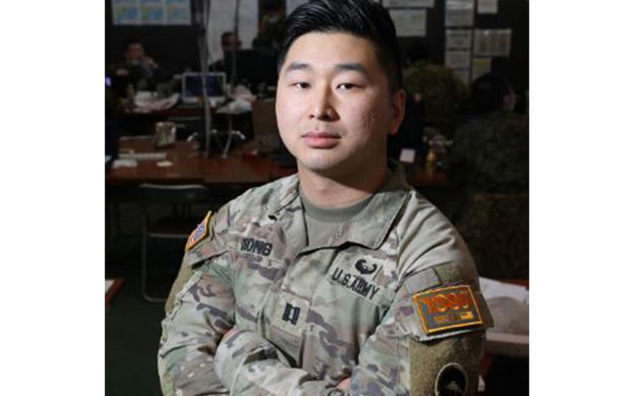 U.S. Army Capt. Joseph Chong, an intelligence officer with United States Army Japan, poses for a photo during Yama Sakura 85 at Camp Higashi-Chitose, Hokkaido, Japan, Dec. 5, 2023. Chong is a first-generation Korean American and is the first member of his family to serve in the U.S. military. (U.S. Army photo by Spc. Austin Robertson)