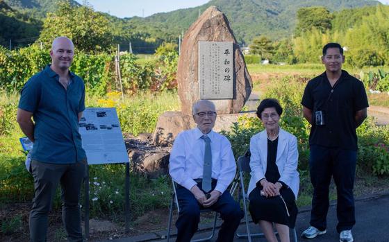From left to right, U.S. Marine Corps Maj. Mason Englehart, communication strategy and operations director, Headquarters and Headquarters squadron (H&HS), Marine Corps Air Station Iwakuni, Shigeaki Mori, a Japanese historian and a survivor of the atomic bombing of Hiroshima, Kayoko Mori, the wife of Mr. Mori, and Gunnery Sgt. Miguel Rosales, communication strategy operations chief, H&HS, MCAS Iwakuni, pose for a group photo during a memorial event, Yanai, Japan.