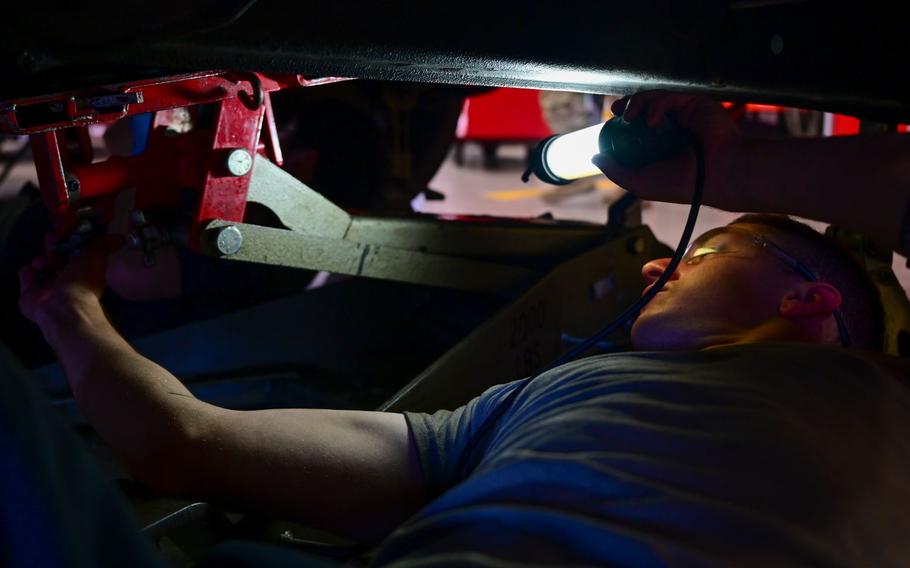 U.S. Air Force Airman 1st Class Van Hoose, 35th Logistic Readiness Squadron (LRS) mechanic, inspects a government official vehicle at Misawa Air Base, Japan. Aug. 19, 2024.