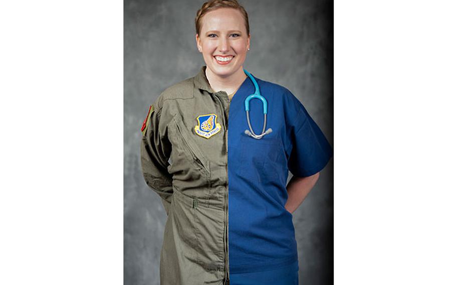 U.S. Air Force Maj. Justine Wells, 35th Surgical Operations Squadron labor and delivery element leader, poses for a photo at Misawa Air Base, Japan, Oct. 20, 2022. Wells is one of the few people to be approved to make the transition from nurse to pilot. (U.S. Air Force illustration by Senior Airman Brieana E. Bolfing)