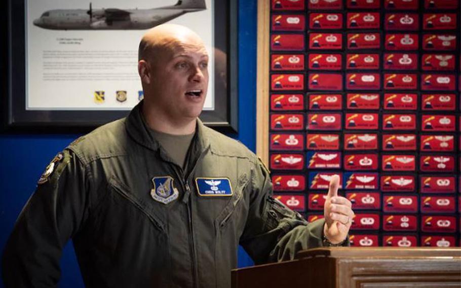 Maj. Christopher Wolff, 374th Airlift Wing flight safety officer, briefs Tokyo Metropolitan Police and Japan Coast Guardsmen during the Mid-Air Collision Avoidance conference, Apr. 7, 2021, at Yokota Air Base, Japan. Local aviators reviewed mid-air collision avoidance techniques and potential flying hotspots. (U.S. Air Force photo by Staff Sgt. Juan Torres)