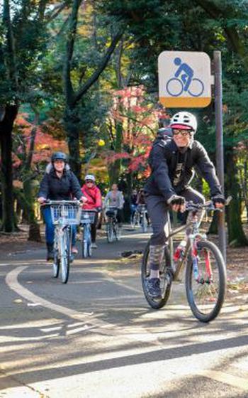 Brad Bennett cycling in Yoyogi Park