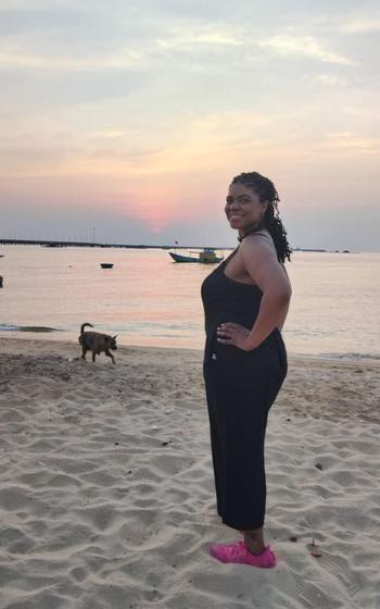 Chrissy standing on the beach