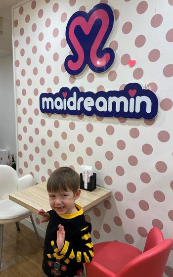 a child posing for a photo at Maidreamin’