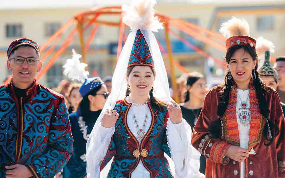 Traditional Mongolian wedding attire in Nauryz.