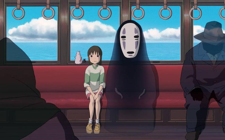 Sen (Chihiro) and Kaonashi; scene from Spirited Away