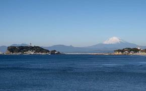 Mount Fuji from afar with Enoshima Island in the foreground, Kamakura, Japan