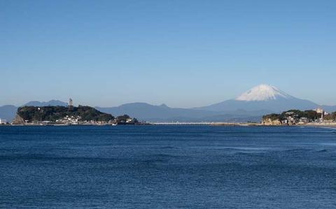 Photo Of Mount Fuji from afar with Enoshima Island in the foreground, Kamakura, Japan