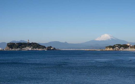 Mount Fuji from afar with Enoshima Island in the foreground, Kamakura, Japan