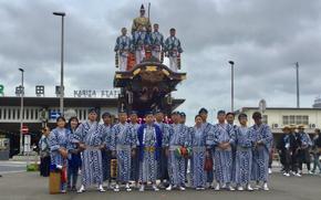 Participants assemble in front of Naritasan Station.