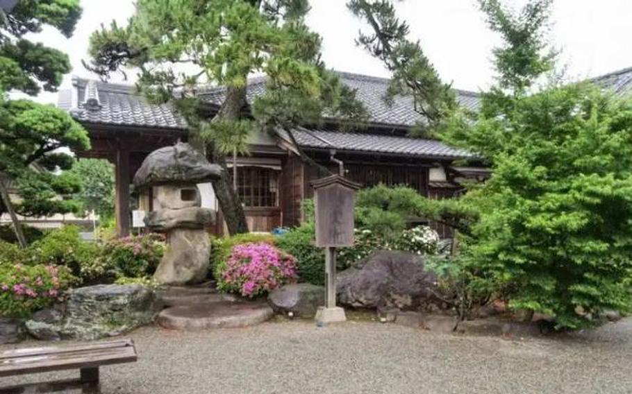 traditional Japanese architecture paired with the well-tended gardens