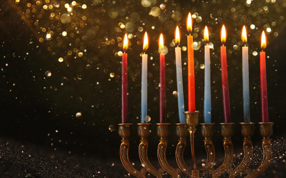 image of jewish holiday Hanukkah background with menorah (traditional candelabra) and candles